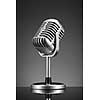 Retro microphone on grey