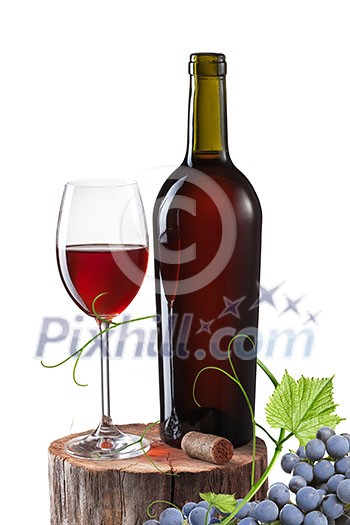 Glass of red wine, bottle and grape on stump isolated on white