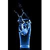 water splash in glass isolated on black