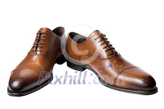 classic brown male leather shoes isolated on white classic brown male leather shoes isolated on white