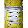 close-up laces on the yellow boots
