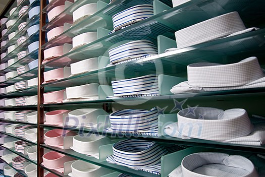shelf with shirts in store shelf with shirts in store