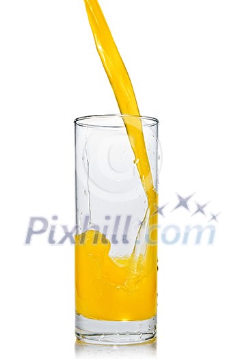 orange juice poring into glass isolated on white orange juice poring into glass isolated on white