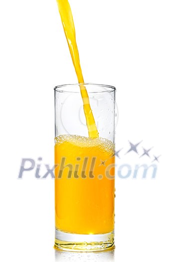 orange juice poring into glass isolated on white orange juice poring into glass isolated on white