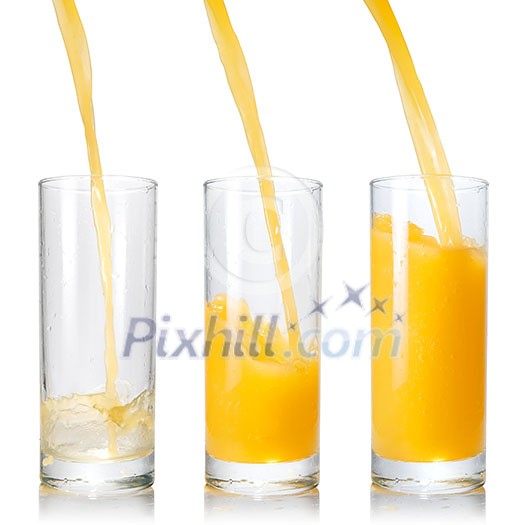 Pouring orange juice into the glass isolated on white Pouring orange juice into the glass isolated on white