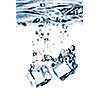 ice cubes dropped into water with splash isolated on white