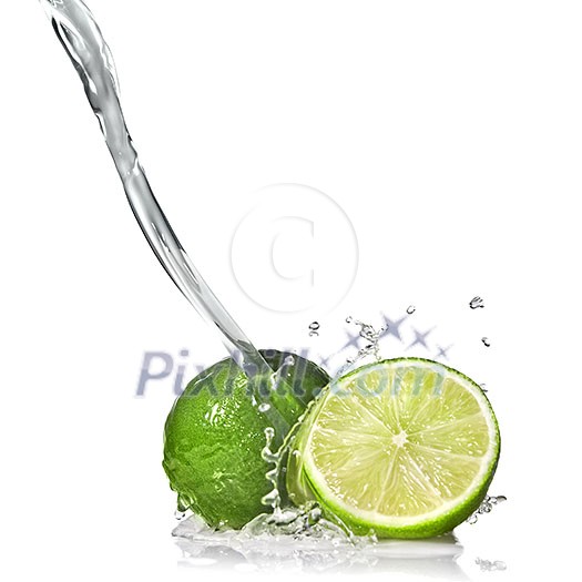 Water splash on lime isolated on white Water splash on lime isolated on white