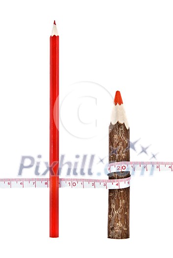Red thick and thin pencils with ruler isloated on white Red thick and thin pencils with ruler isloated on white