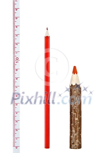 Red thick and thin pencils with ruler isloated on white Red thick and thin pencils with ruler isloated on white