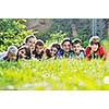 happy children group  have fun outdoor in nature at suny day