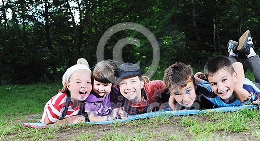 happy children group have fun outdoor in nature at suny day happy children group have fun outdoor in nature at suny day
