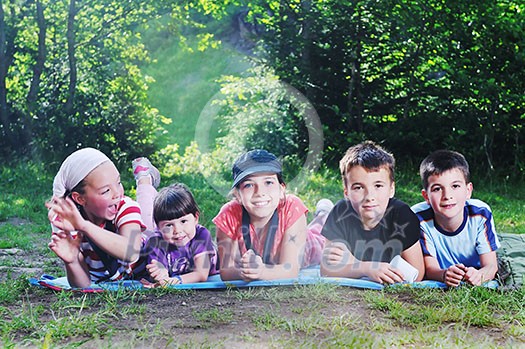 happy children group have fun outdoor in nature at suny day happy children group have fun outdoor in nature at suny day