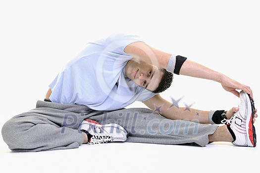 young man exercise fitness sport and strech isolated on white in studio young man exercise fitness sport and strech isolated on white in studio
