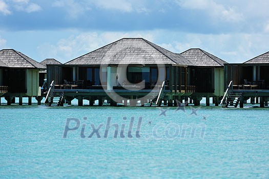 tropical water home villas resort on Maldives island at summer vacation tropical water home villas resort on Maldives island at summer vacation