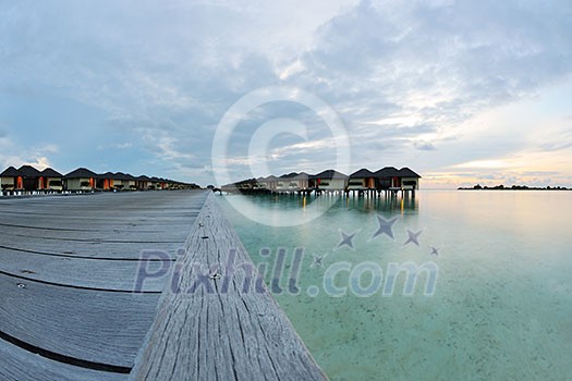 tropical water home villas resort on Maldives island at summer vacation tropical water home villas resort on Maldives island at summer vacation