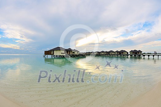 tropical water home villas resort on Maldives island at summer vacation tropical water home villas resort on Maldives island at summer vacation