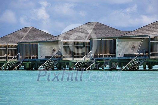 tropical water home villas resort on Maldives island at summer vacation tropical water home villas resort on Maldives island at summer vacation
