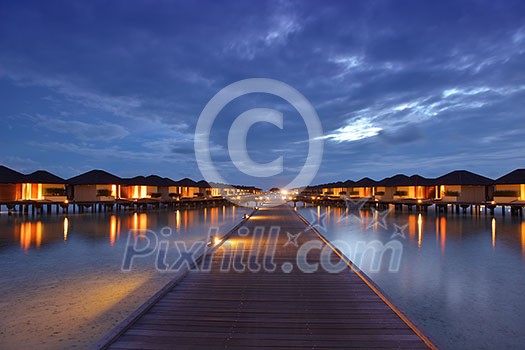 tropical water home villas resort on Maldives island at summer vacation tropical water home villas resort on Maldives island at summer vacation