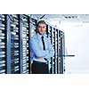 young handsome business man  engeneer in datacenter server room