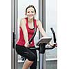 young woman exercise fitness and workout while run on track in sport club