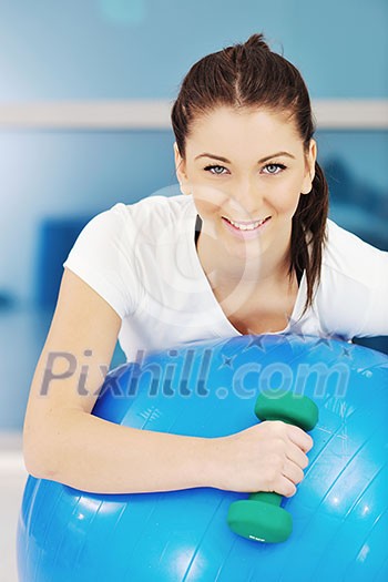 beaudiful young woman fitness workout with weights at sport club beaudiful young woman fitness workout with weights at sport club