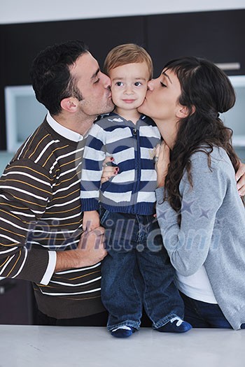 happy young family have fun and relaxing at new home with bright furniture happy young family have fun and relaxing at new home with bright furniture