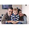 happy young family have fun and relaxing at new home with bright furniture