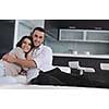 happy young couple relax at modern home living room indoor