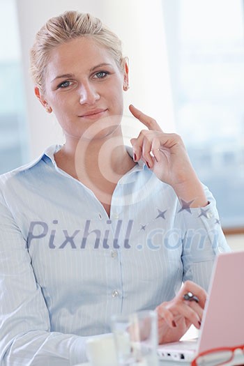 one happy young business woman working on laptop computer at group team meeting at modern office one happy young business woman working on laptop computer at group team meeting at modern office