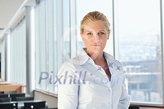 one happy young business woman working on laptop computer at group team meeting at modern office one happy young business woman working on laptop computer at group team meeting at modern office