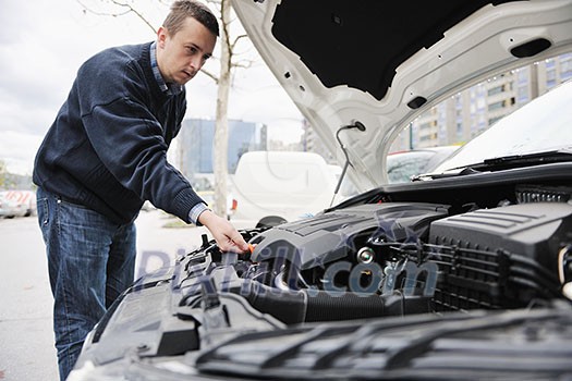 man looking at new car vihicle engine and try to find probelm at repair fix and maintanance service man looking at new car vihicle engine and try to find probelm at repair fix and maintanance service
