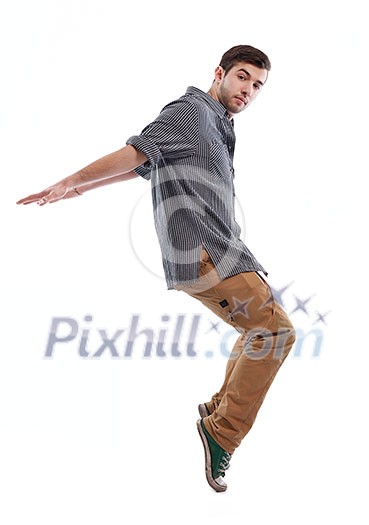 young boy man teen dancing and jumping isolated on white background in studio young boy man teen dancing and jumping isolated on white background in studio