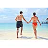 happy young romantic couple in love have fun running and relaxing on beautiful beach