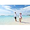 happy young romantic couple in love have fun running and relaxing on beautiful beach