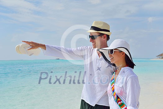 happy young romantic couple in love have fun running and relaxing on beautiful beach happy young romantic couple in love have fun running and relaxing on beautiful beach