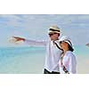 happy young romantic couple in love have fun running and relaxing on beautiful beach