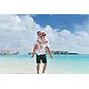 happy young romantic couple in love have fun running and relaxing on beautiful beach