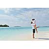 happy young romantic couple in love have fun running and relaxing on beautiful beach