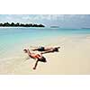 happy young romantic couple in love have fun running and relaxing on beautiful beach