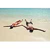 happy young romantic couple in love have fun running and relaxing on beautiful beach