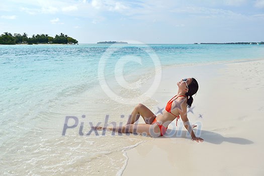 beautiful and happy woman girl on beach have fun and relax on summer vacation over the sea beautiful and happy woman girl on beach have fun and relax on summer vacation over the sea