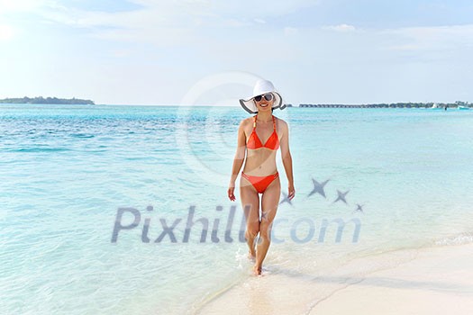 beautiful and happy woman girl on beach have fun and relax on summer vacation over the sea beautiful and happy woman girl on beach have fun and relax on summer vacation over the sea