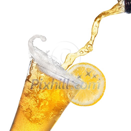 Beer pouring from bottle into glass with lemon isolated on white Beer pouring from bottle into glass with lemon isolated on white