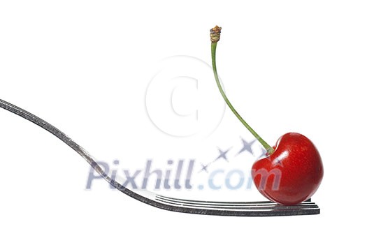 red cherry on fork isolated on white red cherry on fork isolated on white