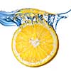 Fresh lemon dropped into water with splash isolated on white