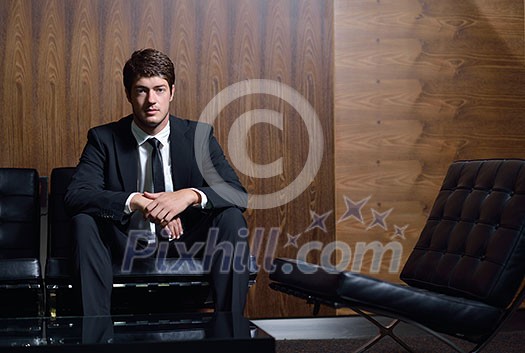 happy young business man work in modern office on computer happy young business man work in modern office on computer