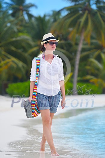 beautifel and happy woman girl on beach have fun and relax on summer vacation over the beautiful tropical sea beautifel and happy woman girl on beach have fun and relax on summer vacation over the beautiful tropical sea