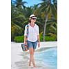 beautifel and happy woman girl on beach have fun and relax on summer vacation  over the beautiful tropical sea