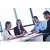 Group of happy young  business people in a meeting at office