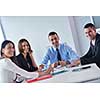 Group of happy young  business people in a meeting at office